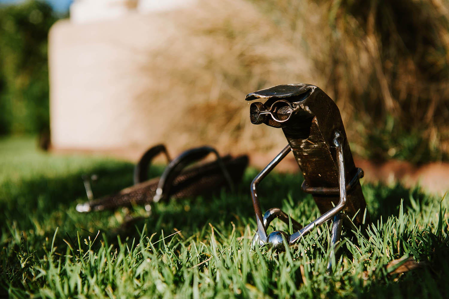 small sculpture in grass